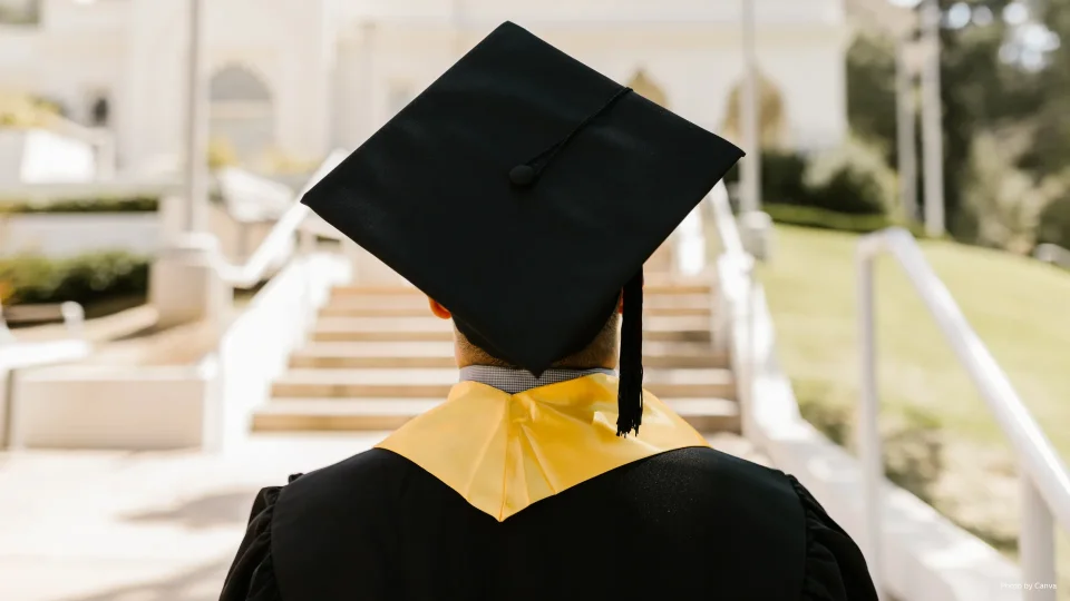 Student in Cap and Gown